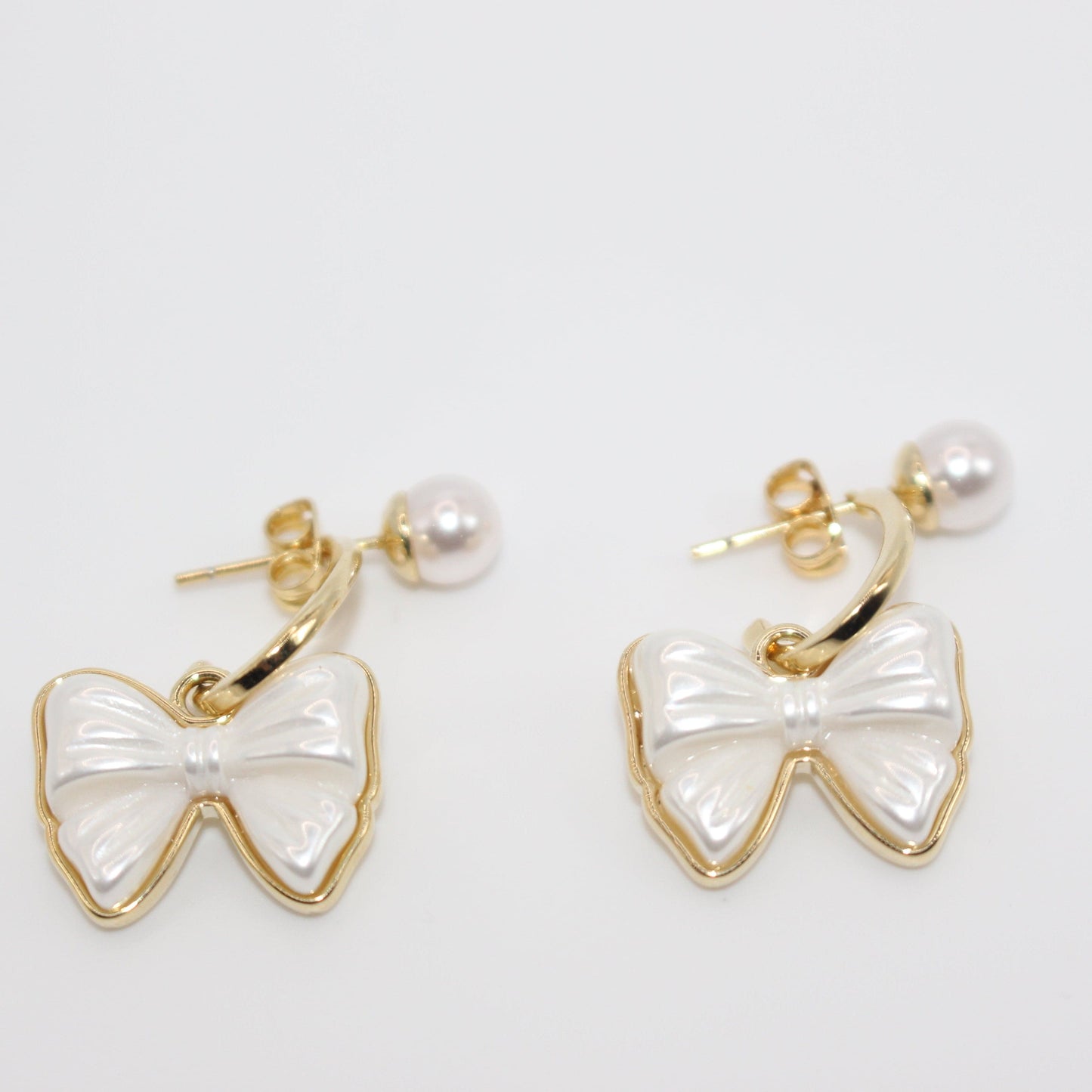 Bow-tiful Pearl Studs